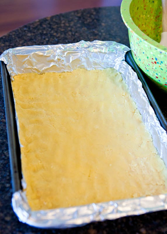 Yellow cake mix on bottom of pan