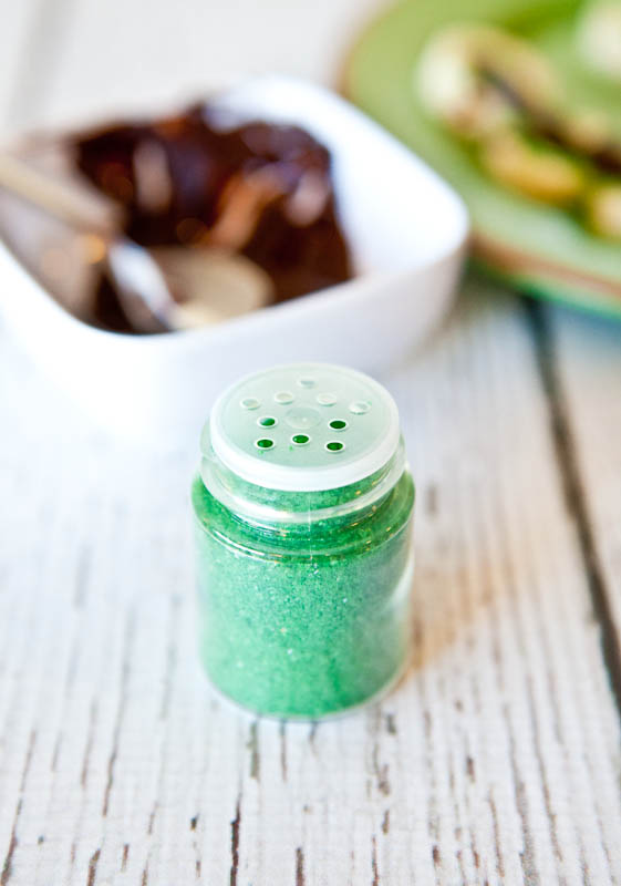 Green sparkly sprinkles in bottle
