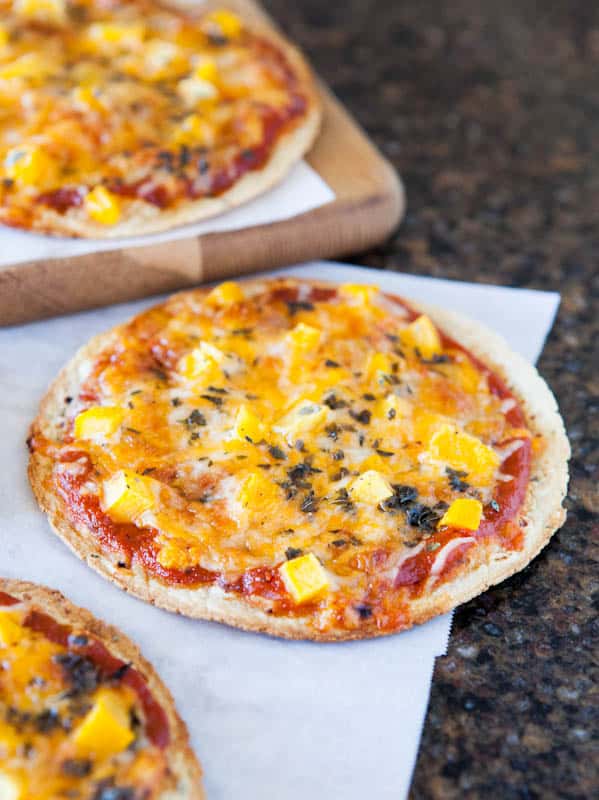 Mango Basil Personal-Sized Tortilla Pizzas – Storebought tortilla shells bake up thin, crispy, and are easy to use for personal-sized pizzas! Everyone can choose their toppings!