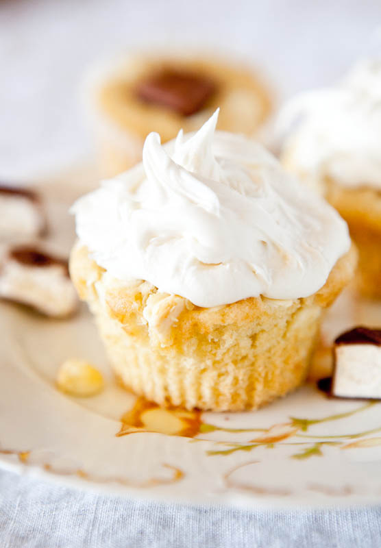 Marshmallow Candy-Stuffed White Chocolate Cupcakes with Fluffy Buttercream Frosting