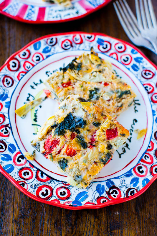 Spinach Artichoke and Roasted Red Pepper Cheesy Squares on patterned plate