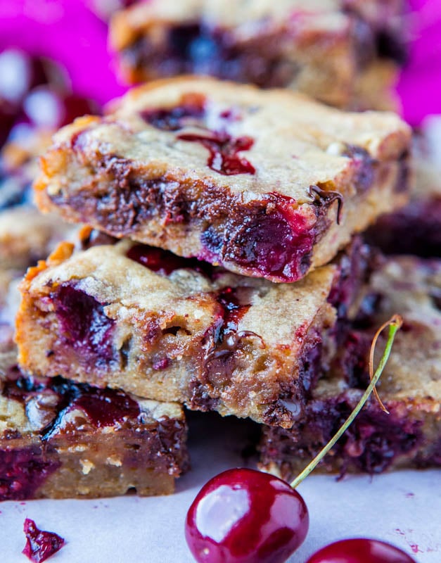 Close up of stacked Chocolate Chip and Cherry Blondies