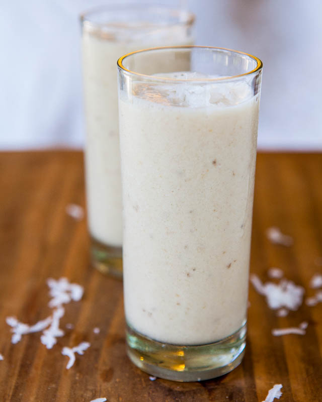 Creamy Coconut Smoothie — Between the coconut milk, coconut extract, and shredded coconut, this smoothie packs in the coconut flavor! Enjoy this smoothie for breakfast, or blend it up for a refreshing poolside drink. 