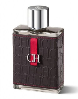 A bottle of ch carolina herrera fragrance with a textured leather cover.