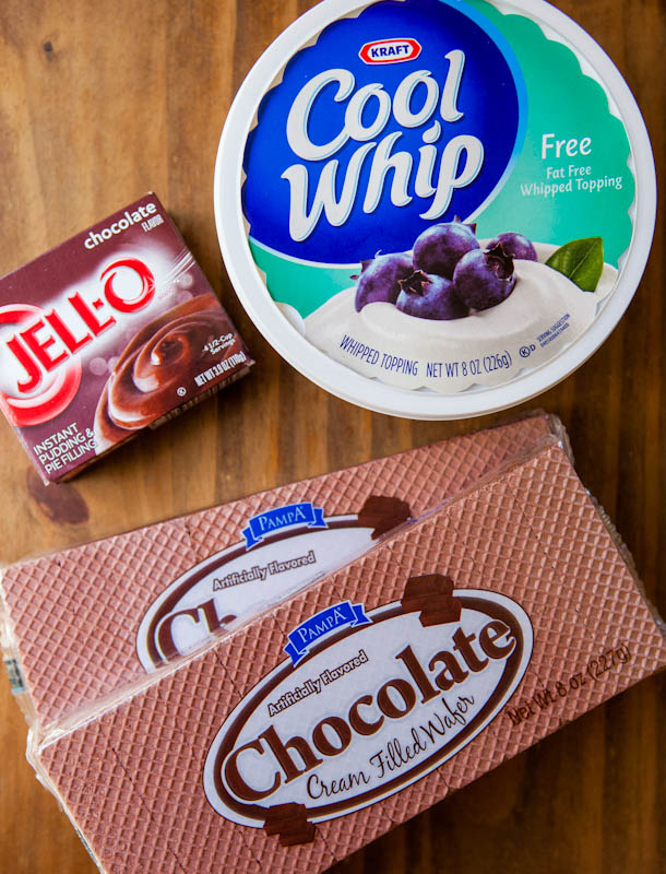 Container of Kraft Cool Whip, Box of chocolate pudding, and two bags of chocolate wafers