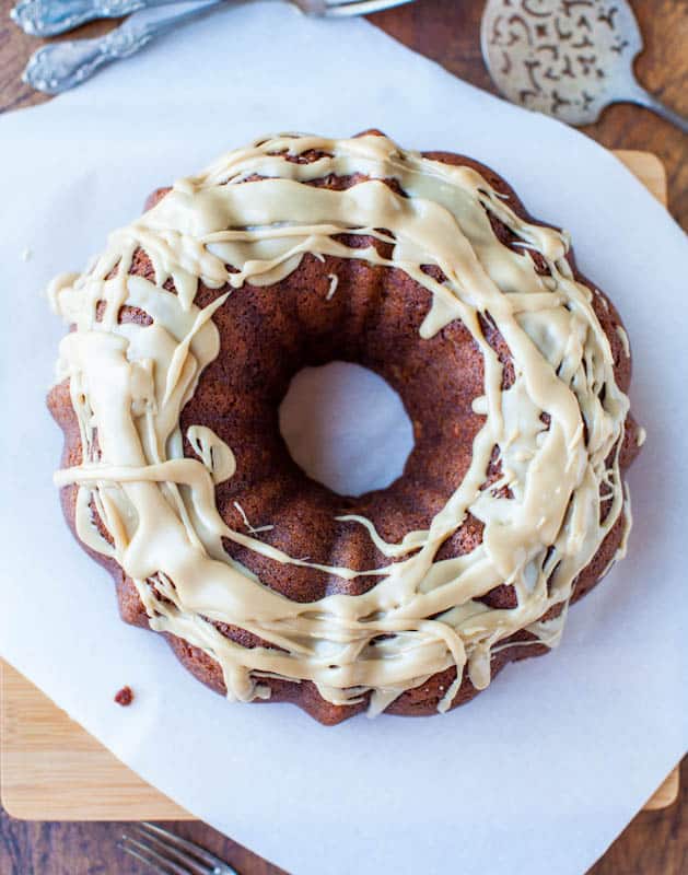 Spiced Apple and Banana Bundt Cake with Vanilla Caramel Glaze - Apple cake meets banana bread with a to-die-for glaze! Best.ever.