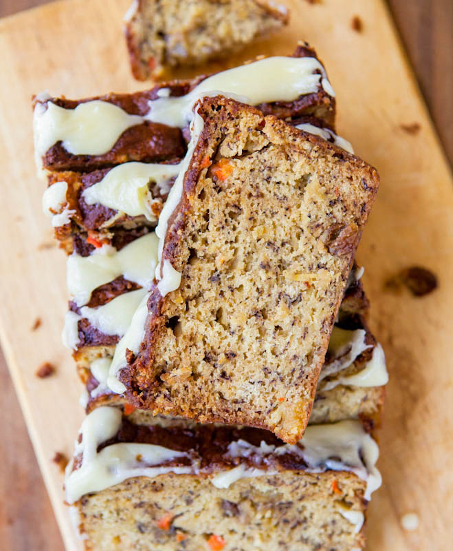 Sliced and stacked Carrot Pineapple Banana Bread with Browned Butter Cream Cheese Frosting