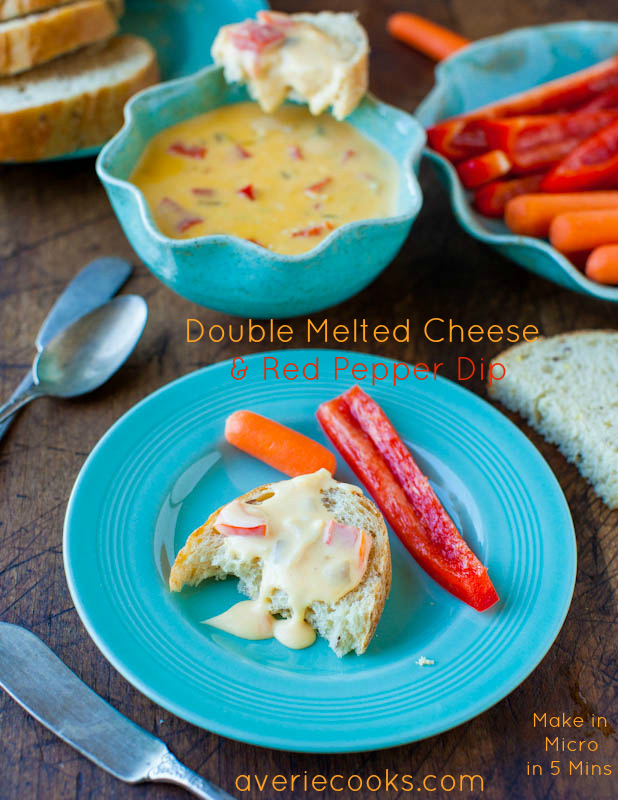 Double Melted Cheese and Red Pepper Dip with piece of bread