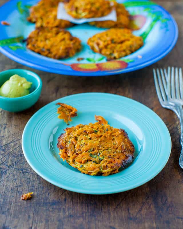 Baked Chipotle Sweet Potato and Zucchini Fritters on blue plate