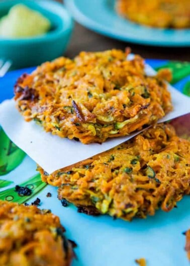 Freshly made vegetable fritters served on a plate.