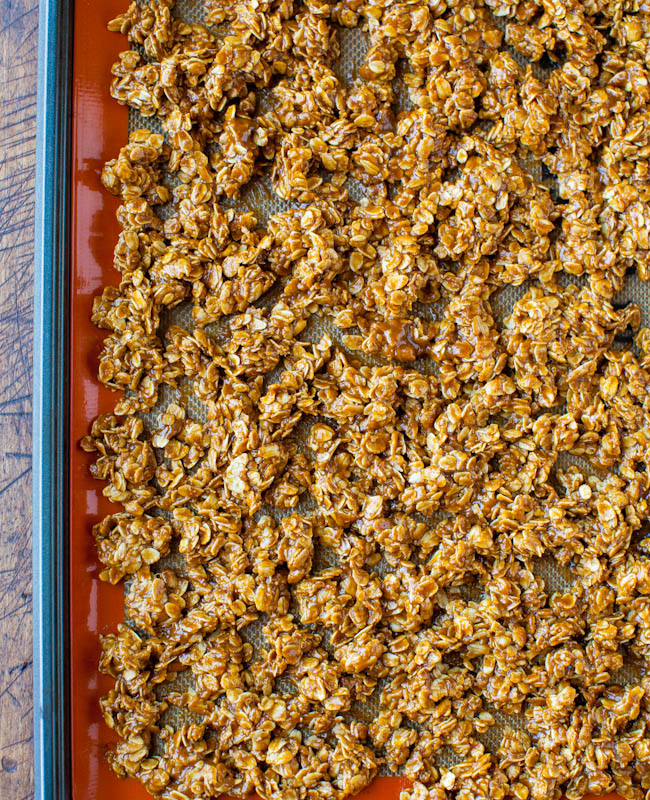 Pumpkin Spice Peanut Butter and Chocolate Chip Granola on pan