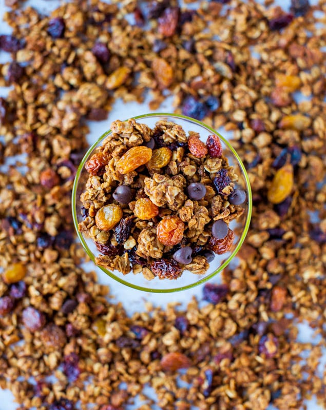 Overhead of Pumpkin Spice Peanut Butter and Chocolate Chip Granola in dish surrounded by more granola