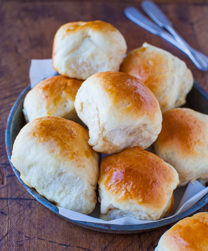 Soft & Fluffy Sweet Dinner Rolls — Lightly sweetened from the honey in the dough and brushed with honey-butter prior to baking!! These dinner rolls are made from scratch and are baked to golden brown perfection! 