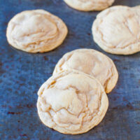 Freshly baked cookies on a baking tray.