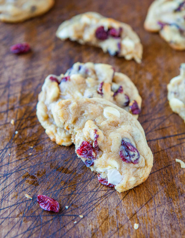 white chocolate and cranberry cookie that's been cut in half 