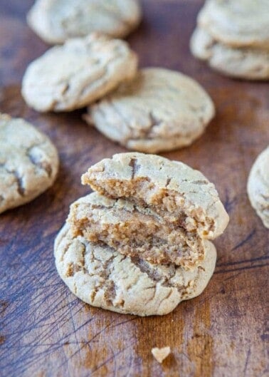 Freshly baked cookies on a wooden surface.