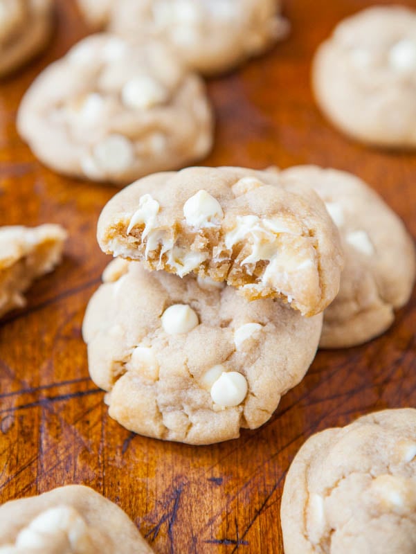 Coconut Oil White Chocolate Cookies - All the butter has been replaced with coconut oil in these soft & chewy cookies loaded with white chocolate! If you've wanted to start baking with coconut oil, this is an easy recipe to try!