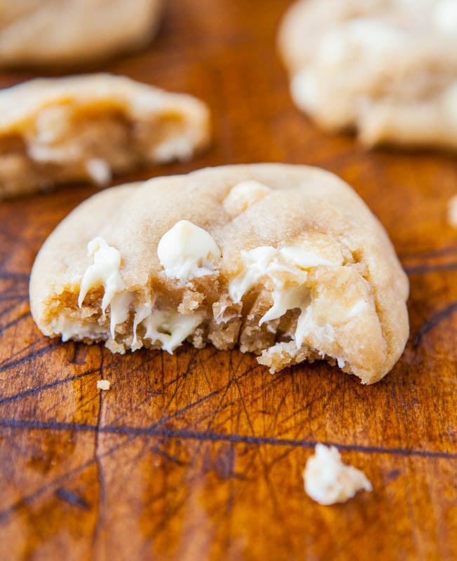 Coconut Oil White Chocolate Cookies - All the butter has been replaced with coconut oil in these soft & chewy cookies loaded with white chocolate! If you've wanted to start baking with coconut oil, this is an easy recipe to try!