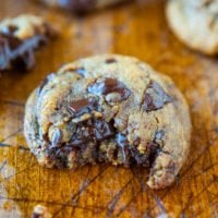 A Peanut Butter Chocolate Chunk Cookie with a bite missing.