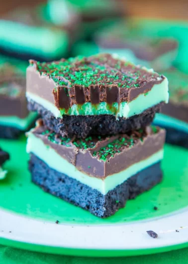 Mint Chocolate Oreo Bars — These three-layered Oreo bars are easy to make and are almost no-bake! The bars are full of mint flavor, a perfect complement for the chocolate fudge and the chocolate-filled Oreo cookie crust.