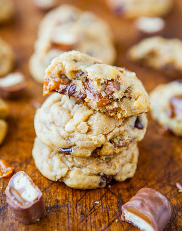 Twix Cookies — My favorite chocolate chip cookies, but stuffed with Twix! Soft, chewy, and look at all that gooey caramel!
