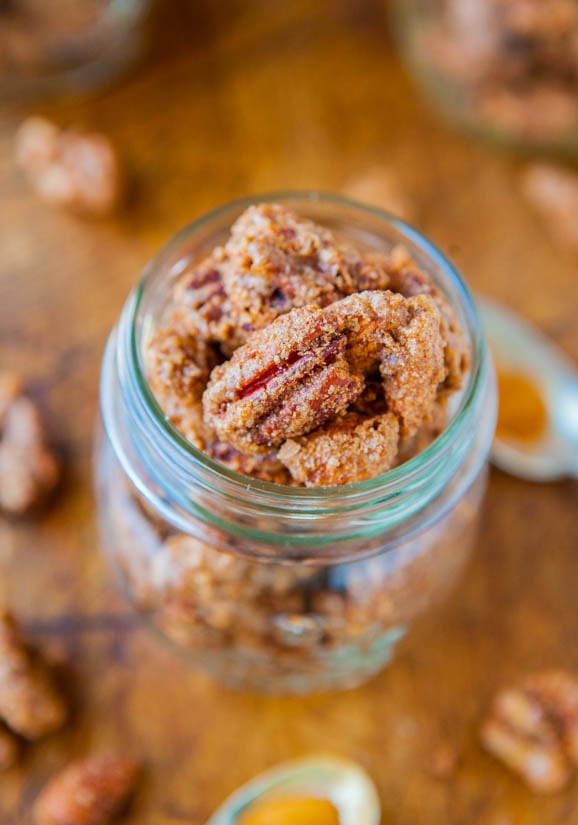 Overhead shot of Cinnamon Sugar Candied Nuts in a glass jar 