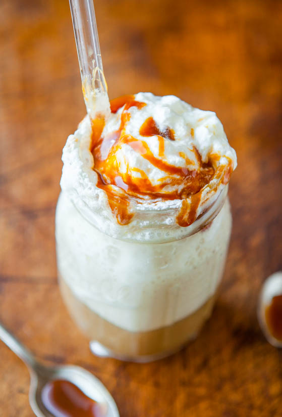 Skinny Caramel Frappuccino in glass topped with whipped topping and caramel sauce