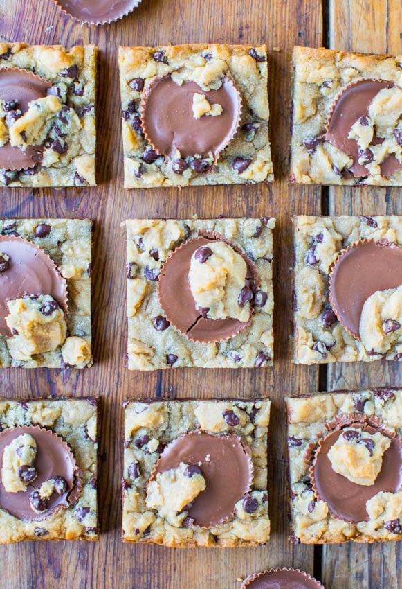 Easy Chocolate Chip Cookie Bars (with PB Cups!) — Looking for things to do with store-bought cookie dough? Look no further! These are the ultimate lazy chocolate chip cookie bars and everyone LOVES them! 