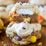 A stuffed cookie with marshmallow and chocolate chips, cut in half to show the gooey interior.