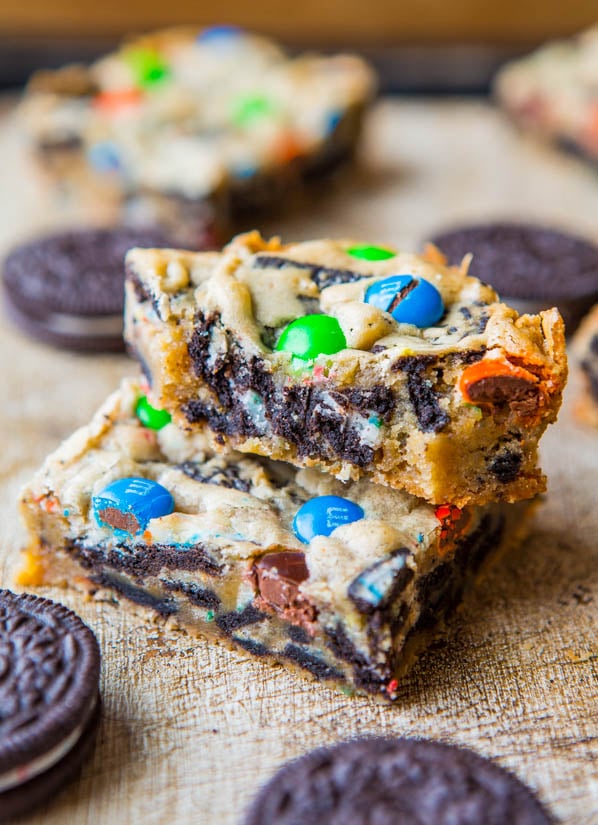 Loaded M&M Oreo Cookie Bars - Stuffed to the max with M&Ms and Oreos! Easy, no-mixer recipe that's ready in 30 minutes. Always a hit at parties!