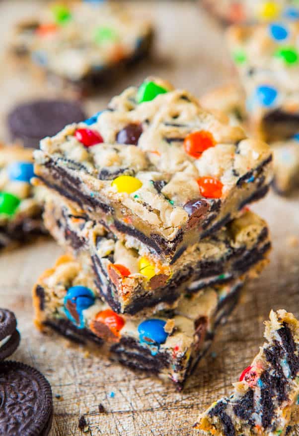 Loaded M&M's Oreo Bars — Stuffed to the max with M&Ms and Oreos! Easy, no-mixer recipe that's ready in 30 minutes. Always a hit at parties!