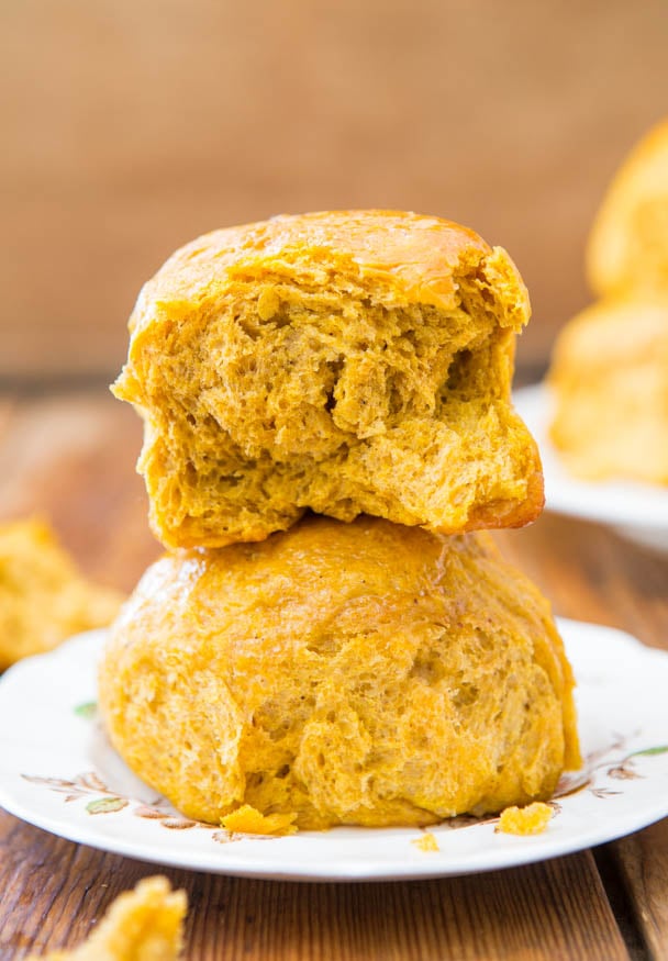Honey Butter Pumpkin Dinner Rolls - Big, soft rolls brushed with honey butter are the best! Everyone loves them and they disappear so fast!