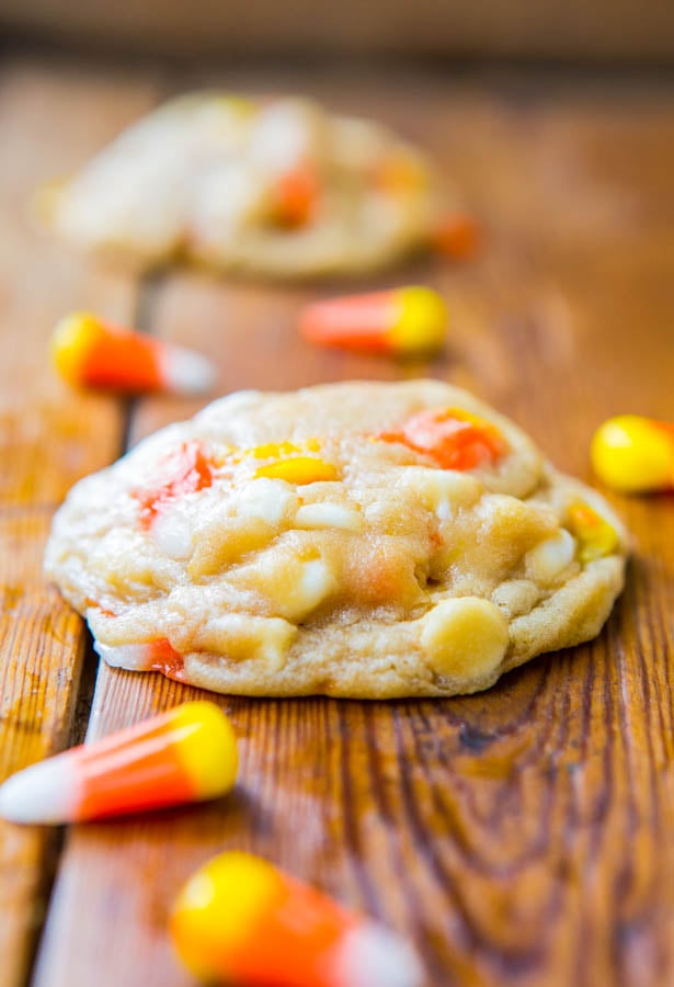 candy corn cookie on wooden surface
