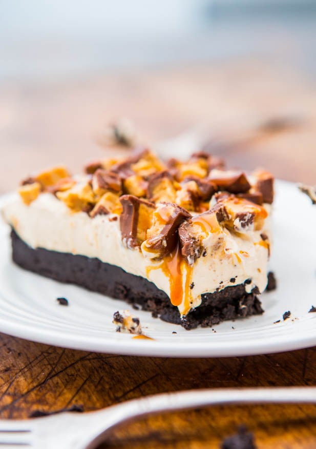 slice of no bake snickers pie on white plate