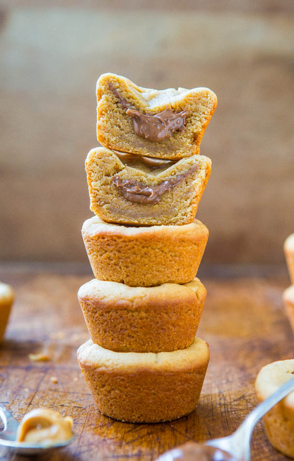 Dark Chocolate Peanut Butter-Stuffed Peanut Butter Cookie Cups - Two kinds of PB in one thick, soft & chewy cookie! Easy recipe at averiecooks.com