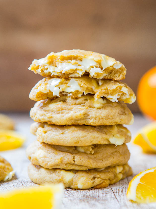 Orange Creamsicle Cookies — These cookies are so soft, buttery, tender, and just melt in your mouth! The dough is lightly perfumed with orange zest and there’s loads of white chocolate in every bite. They remind me of an Orange Creamsicle, but in cookie form! 