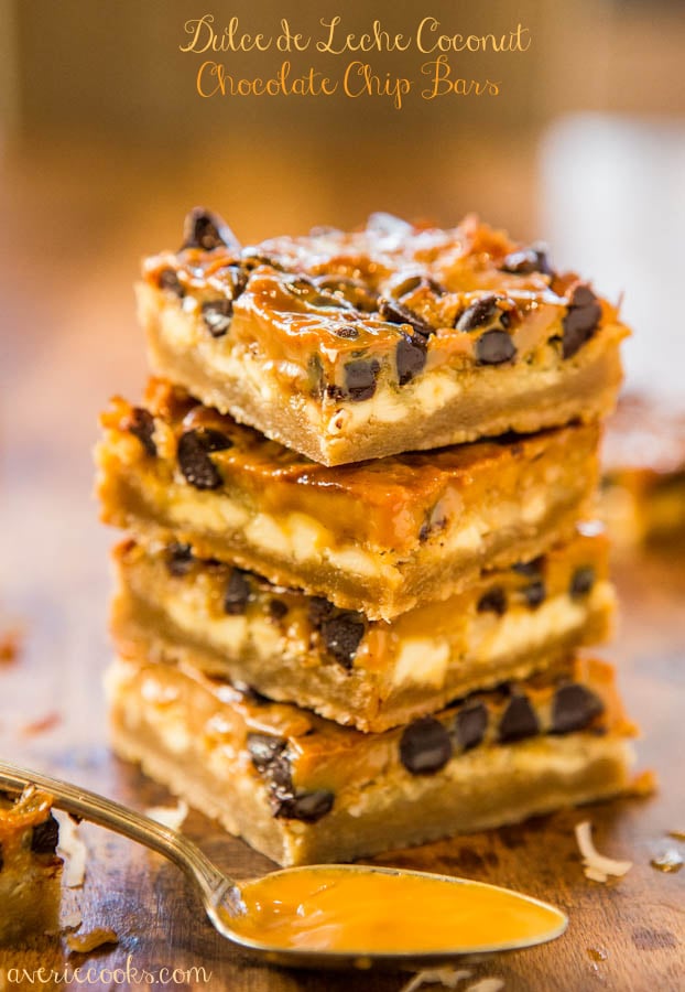 Dulce de Leche Coconut Chocolate Chip Bars - 5 rich layers in these soft, gooey, & chewys bars that take less than 5 minutes to make. Easy recipe at averiecooks.com