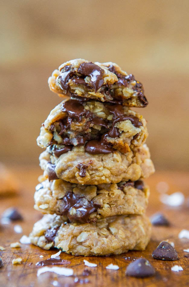Oatmeal Coconut Chocolate Chip Cookies stacked with one split open