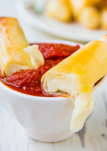 Mozzarella cheese sticks dipped in marinara sauce.