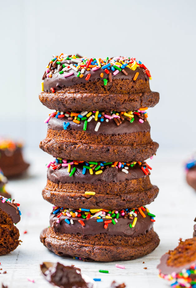 stack of four chocolate sprinkle donuts