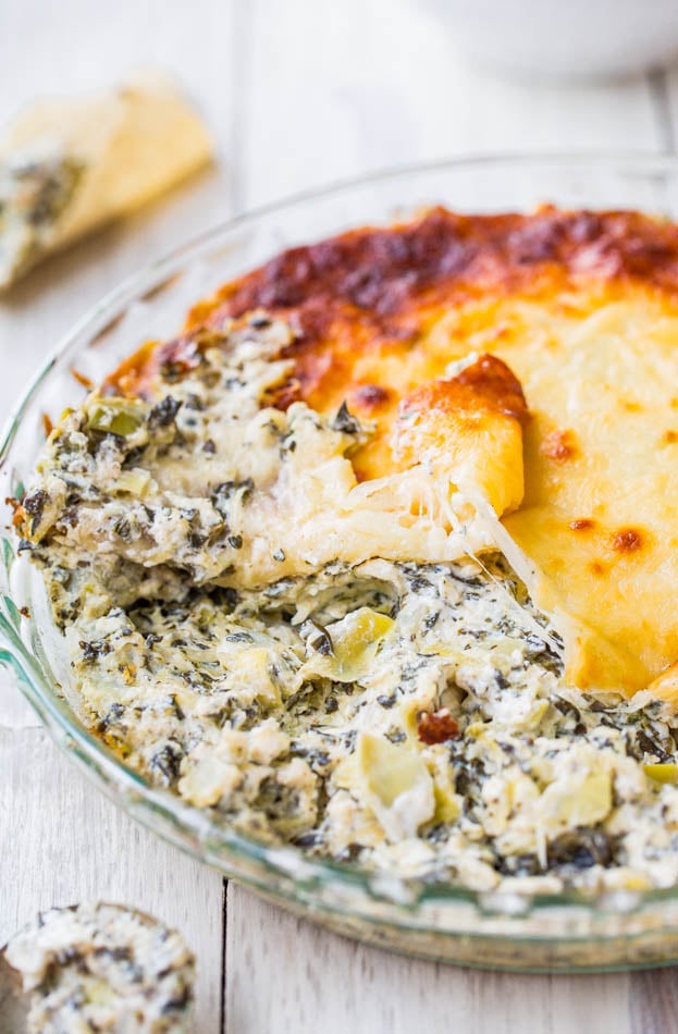 Baked Spinach, Artichoke, and Mozzarella Dip in a clear dish