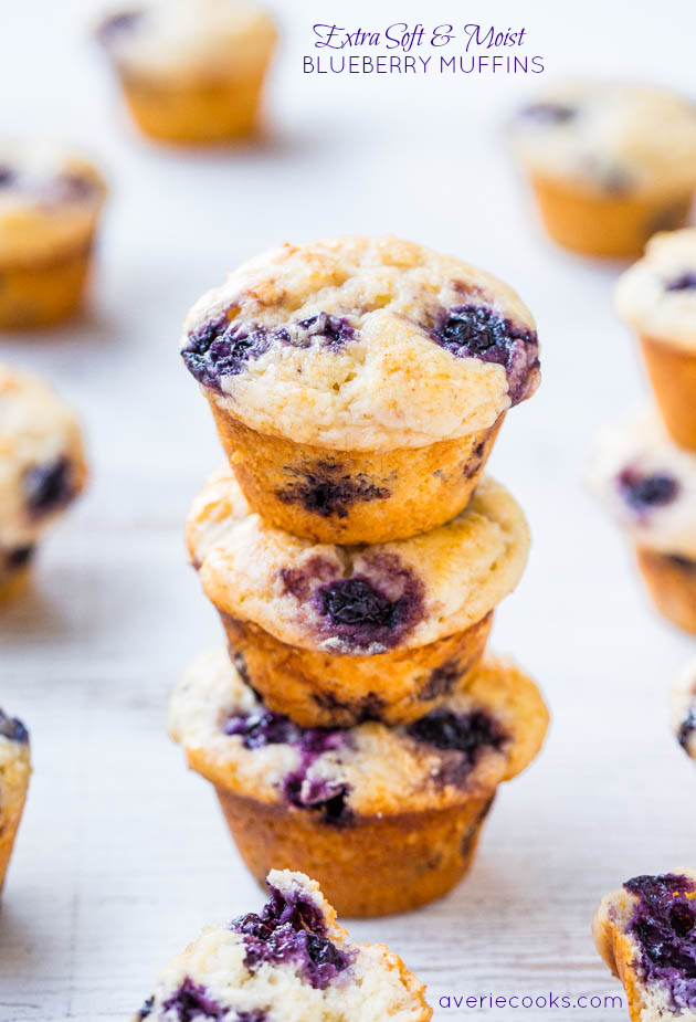 three homemade blueberry muffins stacked on top of each other 