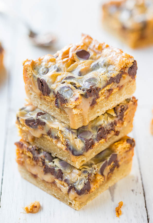 Caramel Peanut Butter Chocolate Chip Gooey Bars - Keep the napkins handy for these soft, gooey bars dripping with the best caramel-peanut butter sauce! So good!