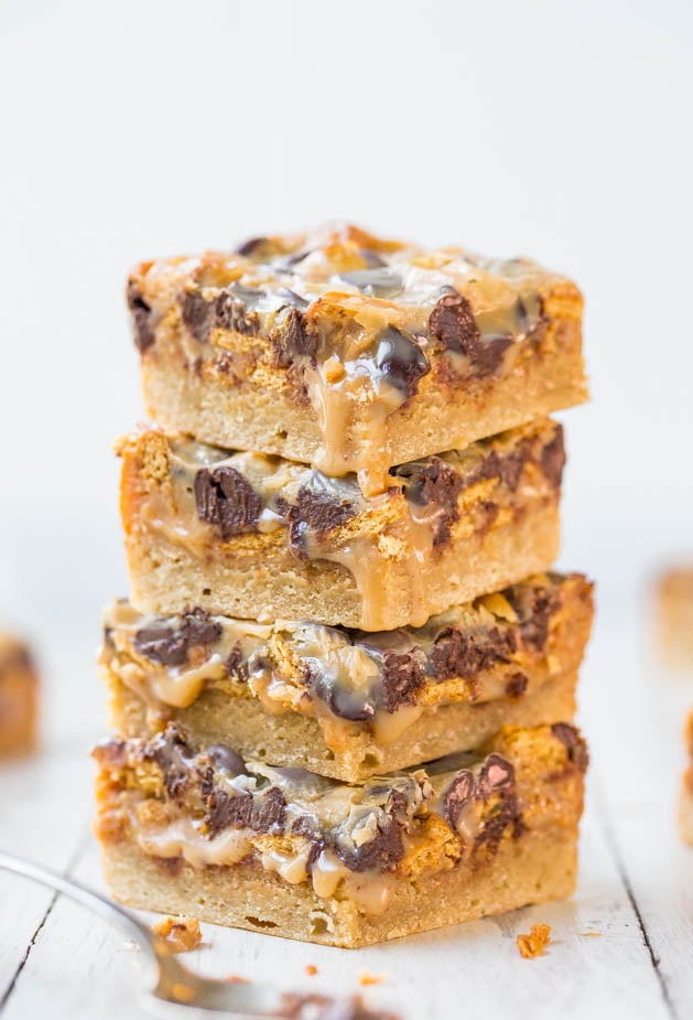 Caramel Peanut Butter Chocolate Chip Gooey Bars - Keep the napkins handy for these soft, gooey bars dripping with the best caramel-peanut butter sauce! So good!
