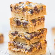 Stack of blondies with chocolate chunks and caramel drizzle.