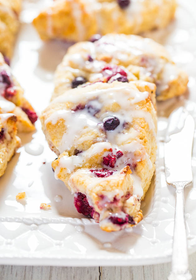 The Best Glazed Mixed Berry Scones - If you've always thought scones were dry, this easy recipe will change your mind forever!