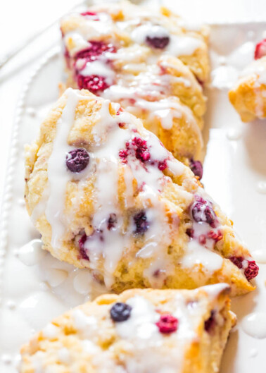 The Best Scone Recipe — These homemade scones are incredibly EASY, NOT DRY, you don’t need to dirty a mixer, and are guaranteed-to-disappear weekend breakfast or brunch!! Made with common pantry ingredients and you can use frozen fruit!!