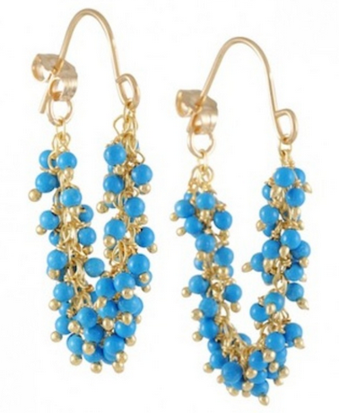 A pair of blue beaded chandelier earrings with gold accents.