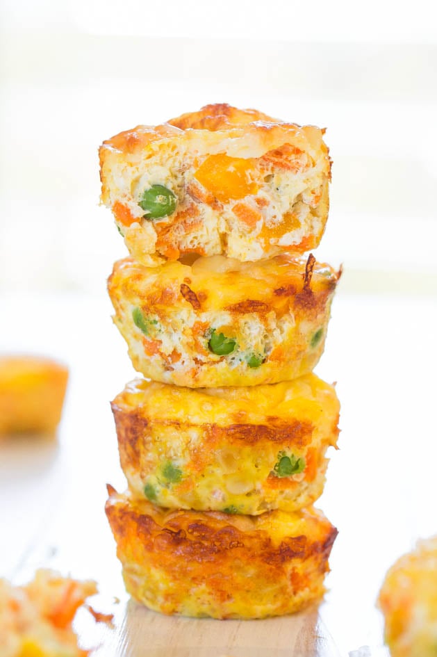 Stack of Healthy Egg Muffins stuffed with veggies and cheese 