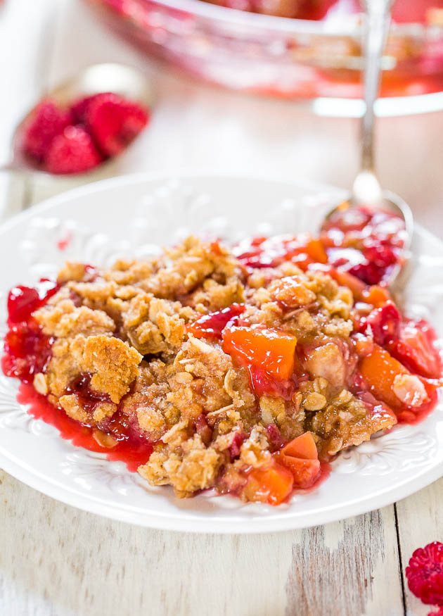 Fresh Peach Raspberry Crisp — This peach oatmeal crisp is impossible to resist! The sweet peaches contrast beautifully with the tart raspberries, and that crumble topping is SO good! 